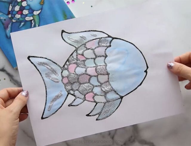 Add glitter to rainbow fish