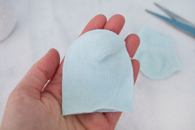 Baby sock cut for snowman hat