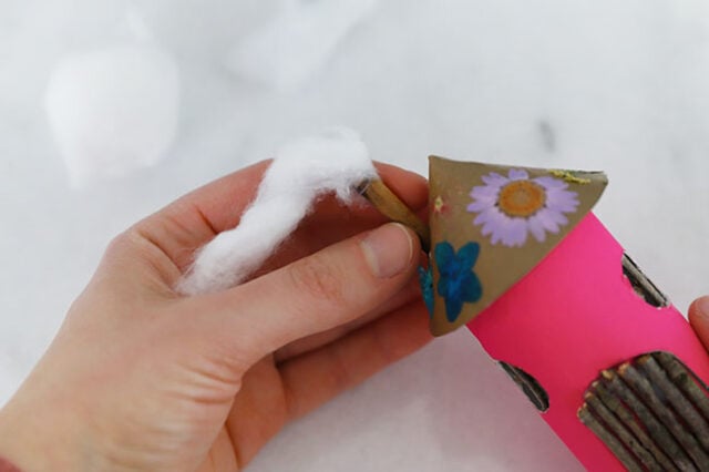 Cotton ball onto pipe cleaner