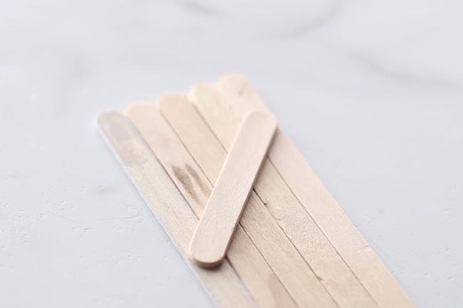 Glue Popsicle Stick to Back