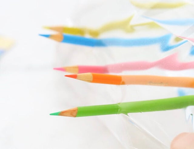 Pencils through bag